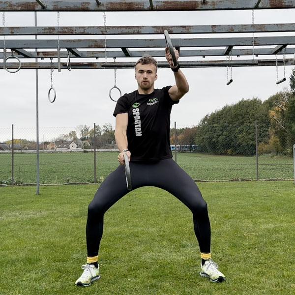 Alternating Front Raises in Squat